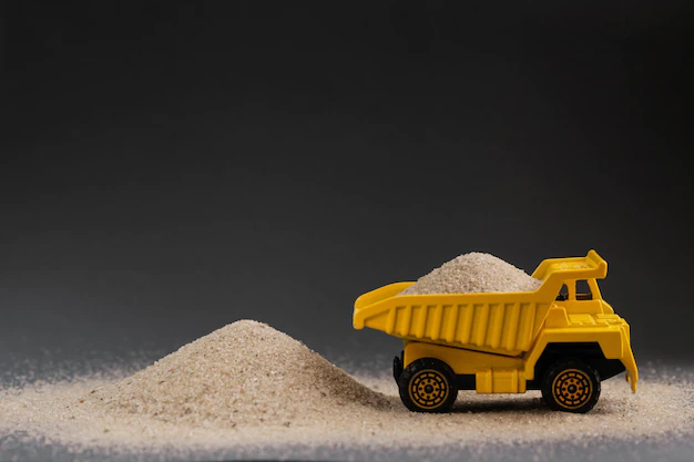 yellow-dump-truck-black-background-bulk-load-materials-sand-bricks-chippings-cement-delivered_536572-10